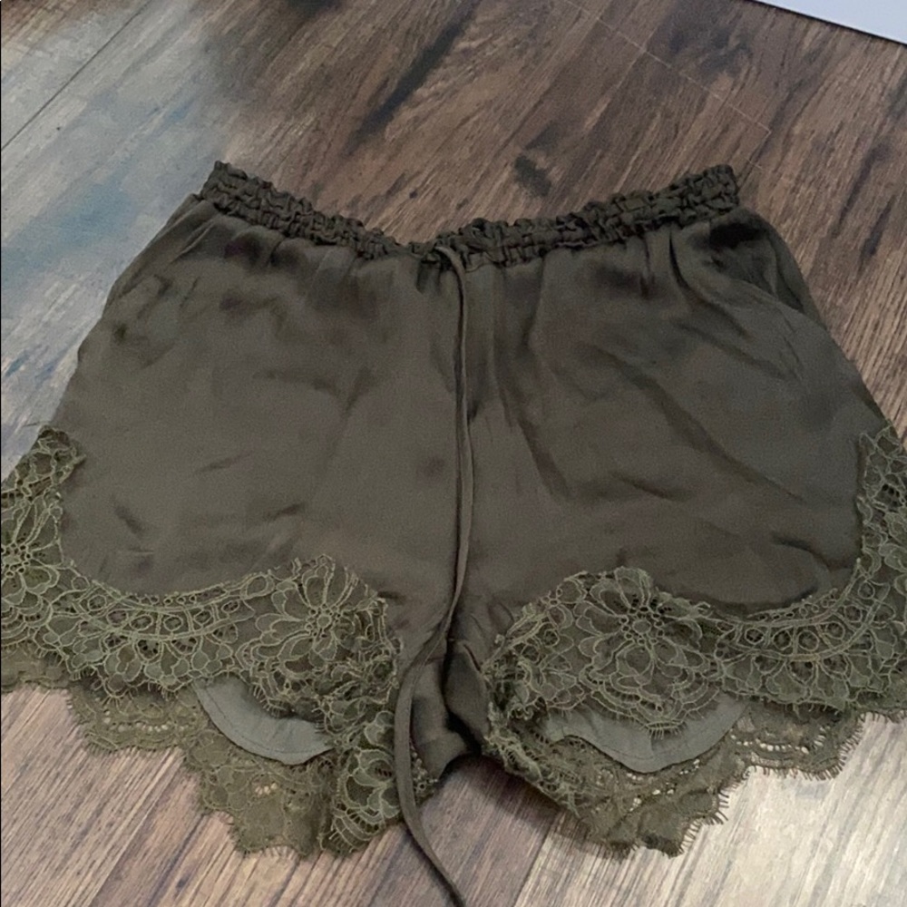 Lace hem green shorts